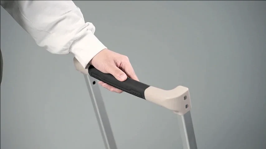 Close view of the folding utility cart pull handle