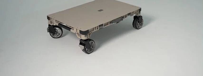 Four-wheel utility cart in low platform transport configuration