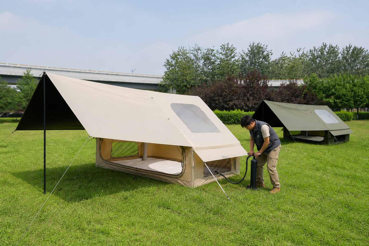 Technician inflating a Pro single-door canopy tent
